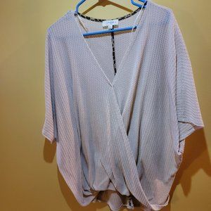 Cream crossove v neck pullover.